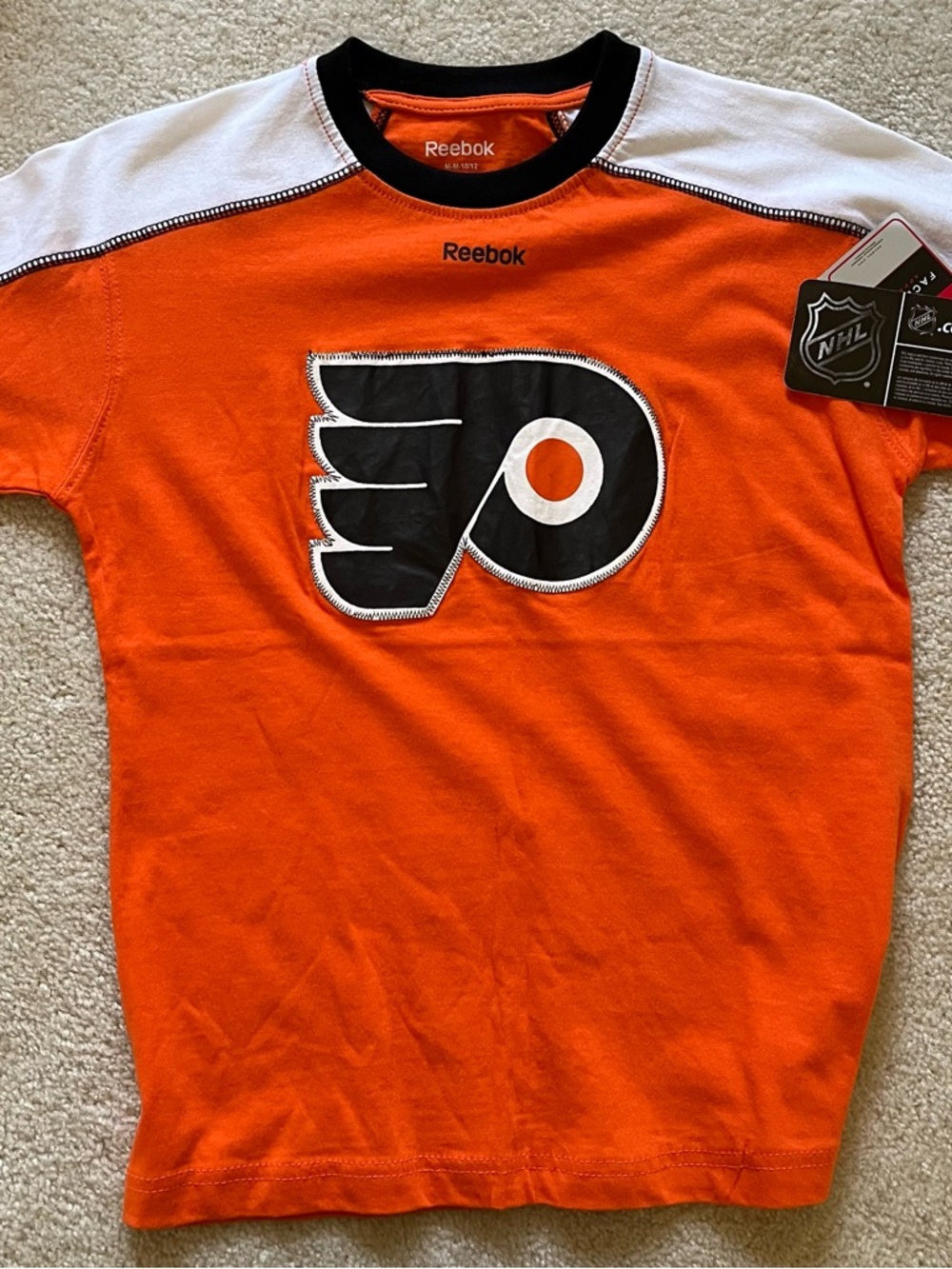 Reebok Orange Tee with Black Collar and White Accents